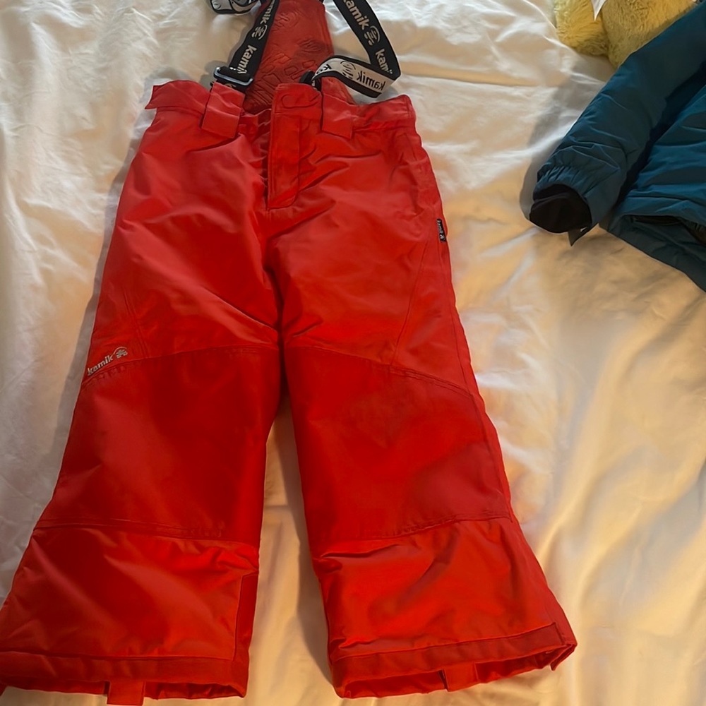 Kids Kamik snow pants. Tomato color. Very warm. Used just for weekly skiing